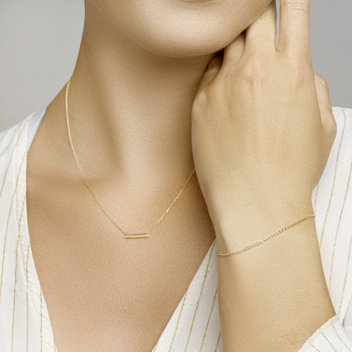 armband balkje 16,5 - 18,5 cm 14K geelgoud