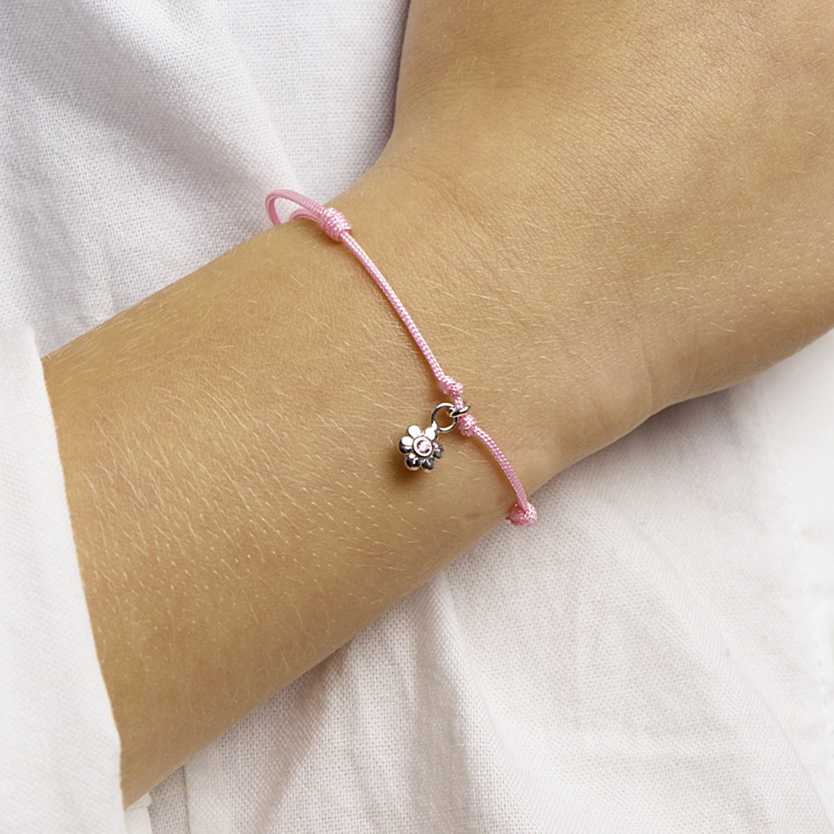 armband bloem roze zirkonia zilver gerhodineerd met rubber/nylon/leer