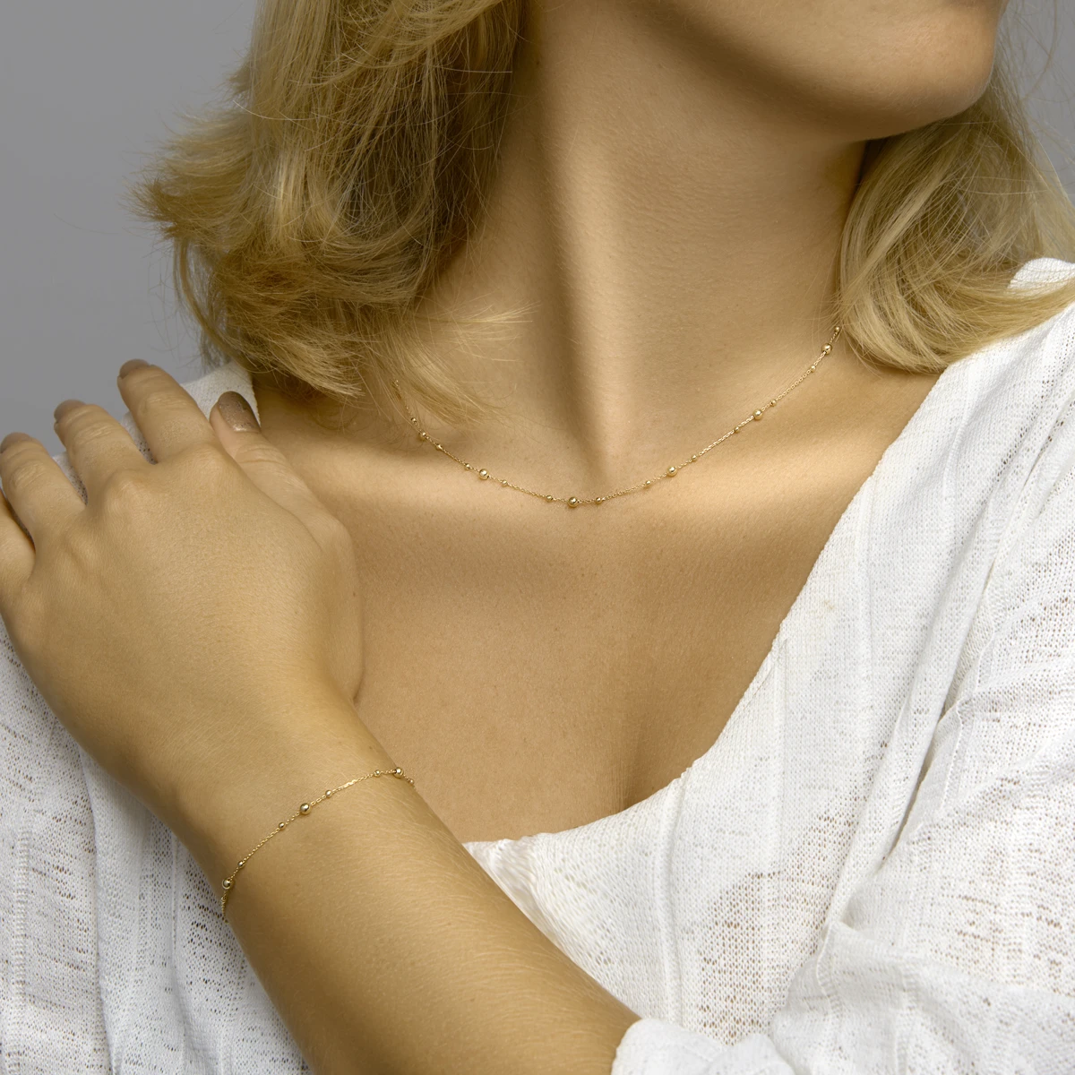 armband bolletjes 0,8 mm 16,5 - 18,5 cm 14K geelgoud