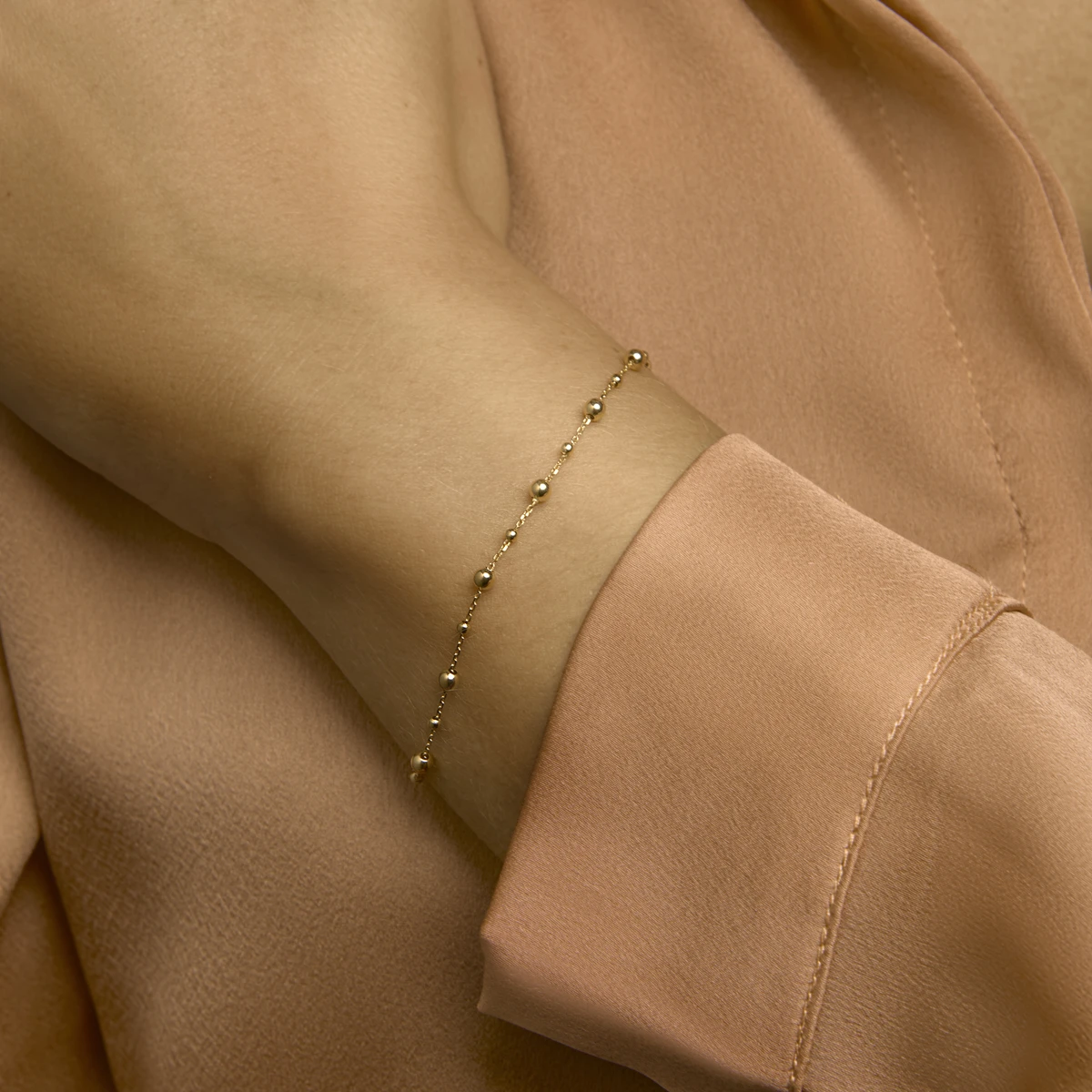 armband bolletjes 0,8 mm 16,5 - 18,5 cm 14K geelgoud