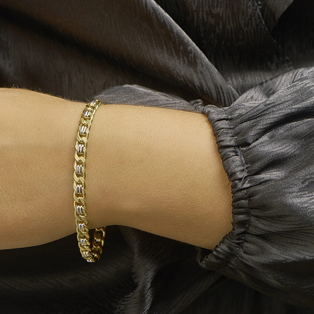 armband geslepen gourmette massief 6,2 mm silgold (bicolor goud met zilverkern)