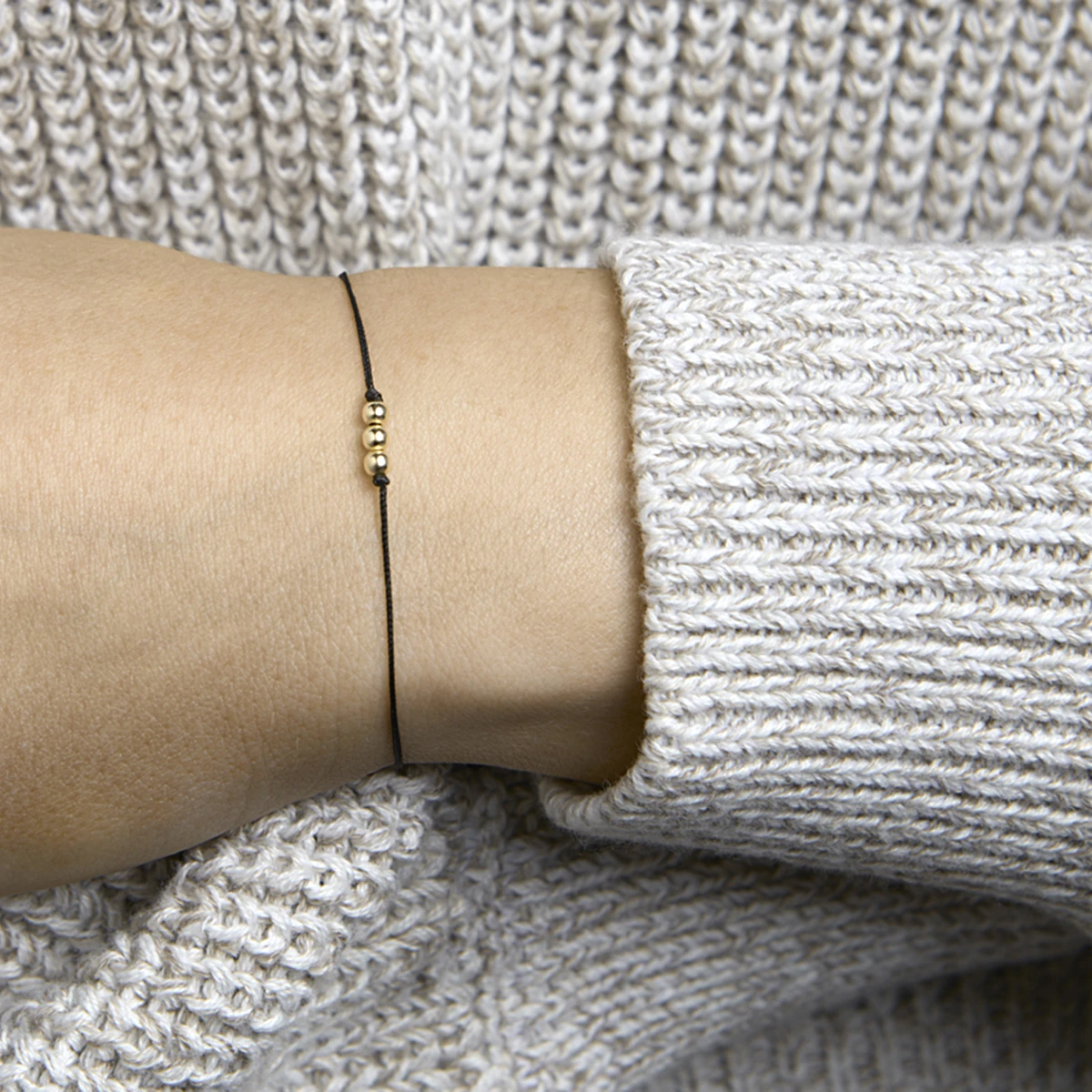 armband katoen bolletjes 13 - 19 cm 14K goud met rubber/nylon/leer