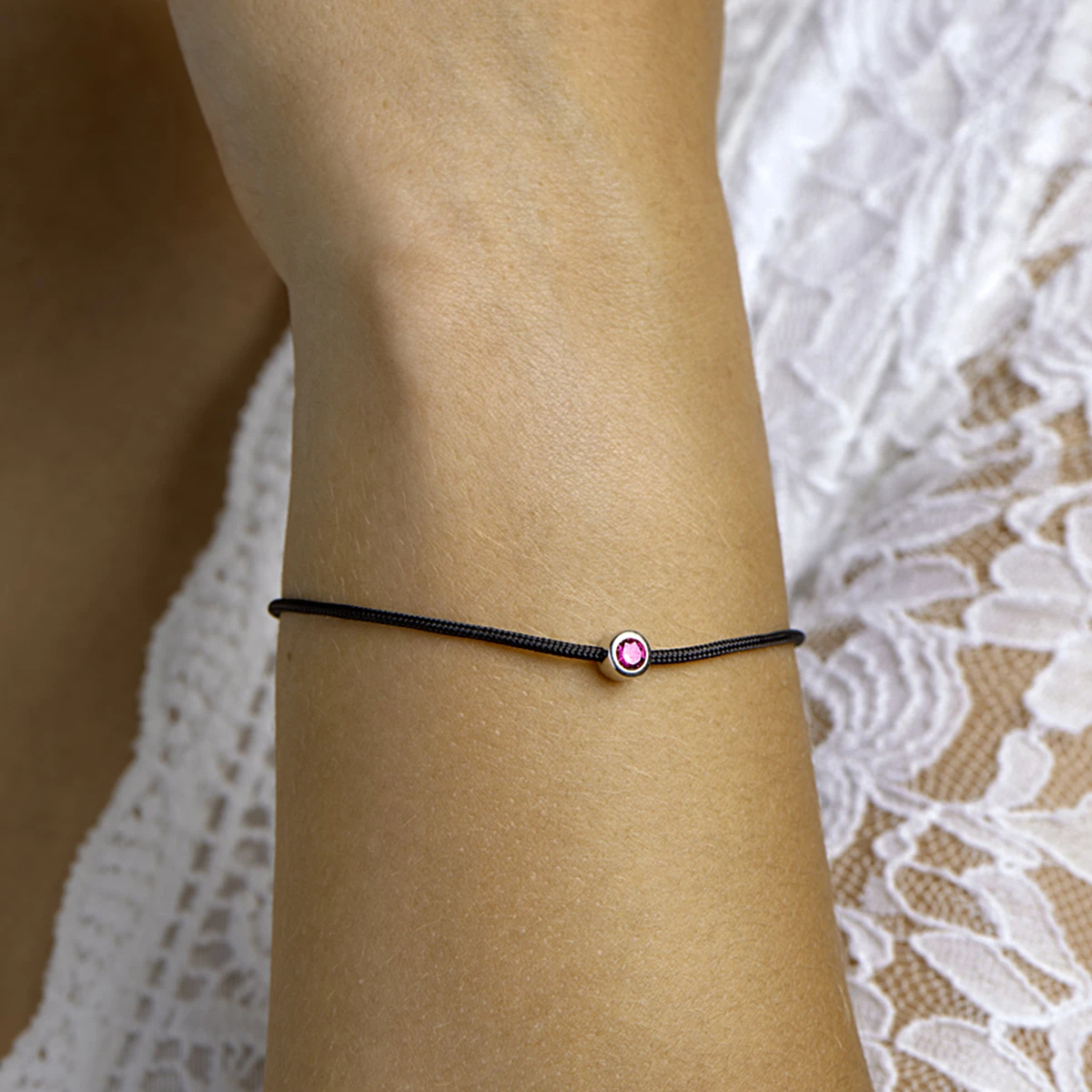 armband katoen synth. robijn 15,5 + 2,5 cm zilver gerhodineerd met rubber/nylon/leer