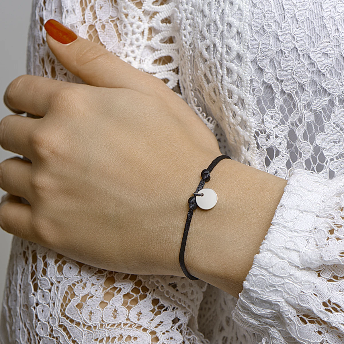 armband satijn rondje zilver gerhodineerd met rubber/nylon/leer