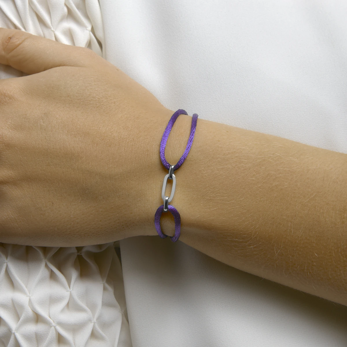 armband satijn zilver gerhodineerd met rubber/nylon/leer