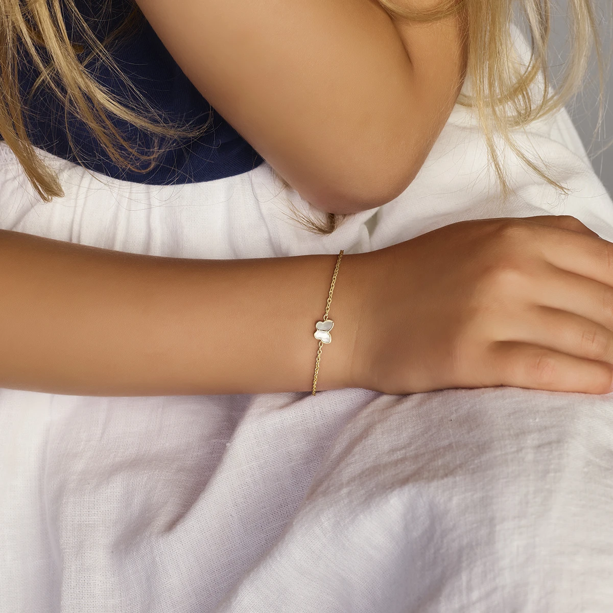 armband vlinder parelmoer 14K geelgoud