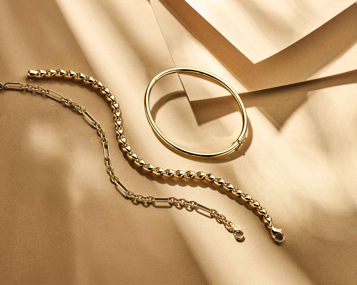 bangle scharnier ronde buis 14K geelgoud