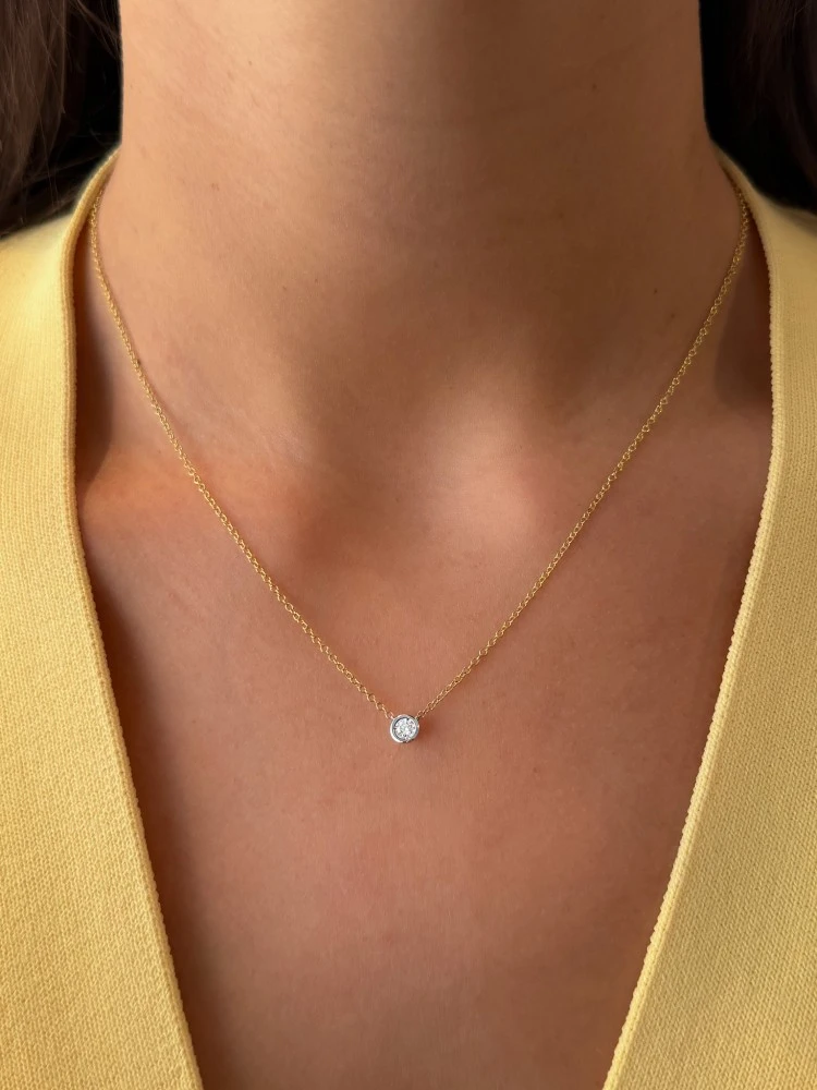 Collier bicolor briljant 0,07 crt.