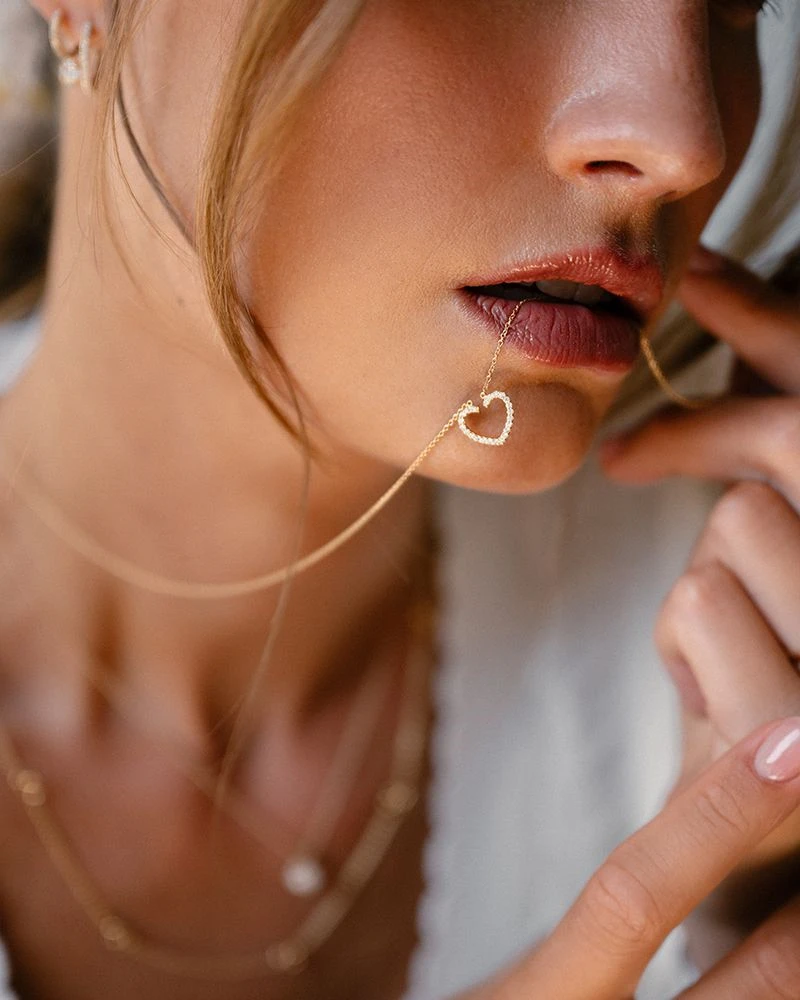 Collier geelgoud briljant 0,12 crt.