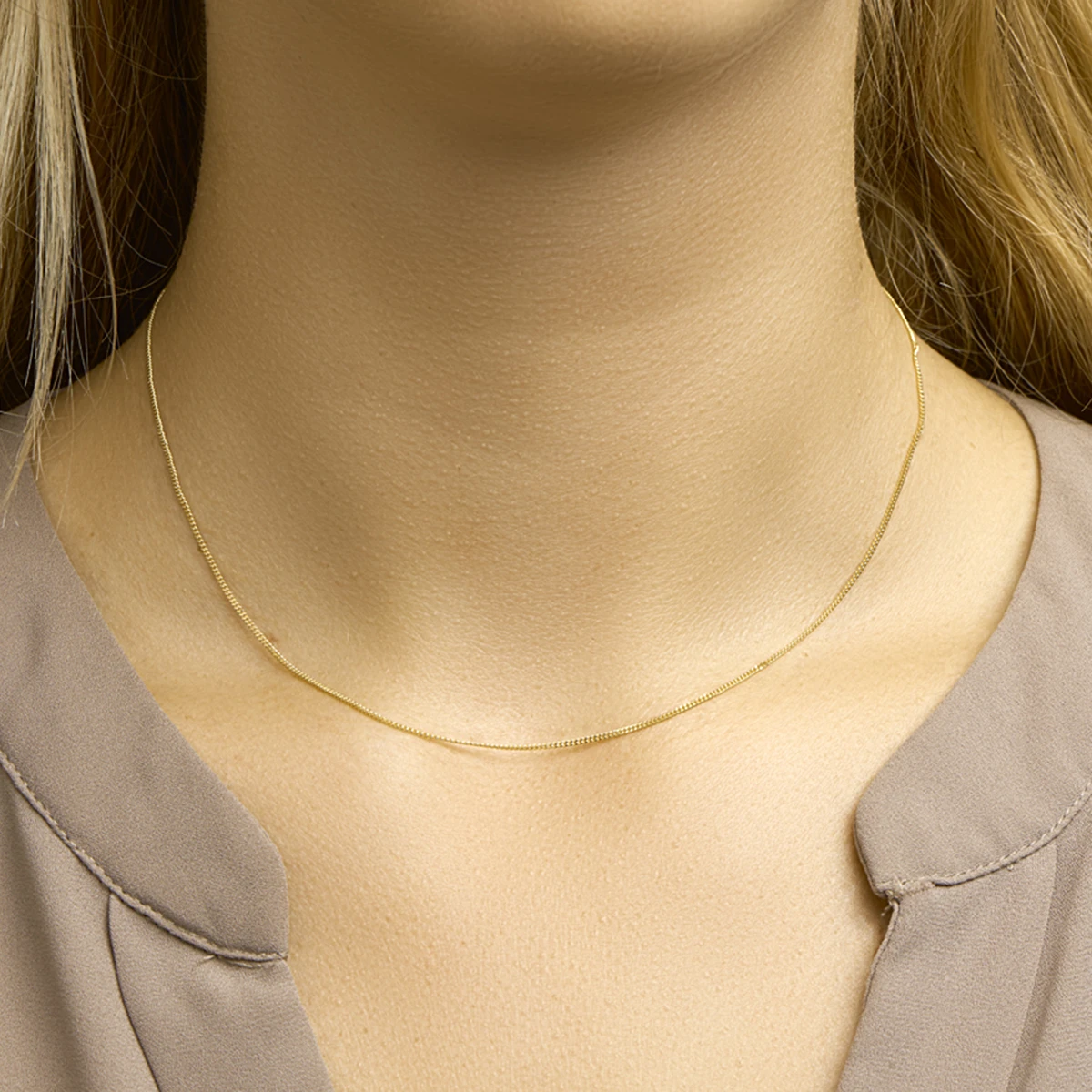 gourmette 1,1 mm 14K geelgoud
