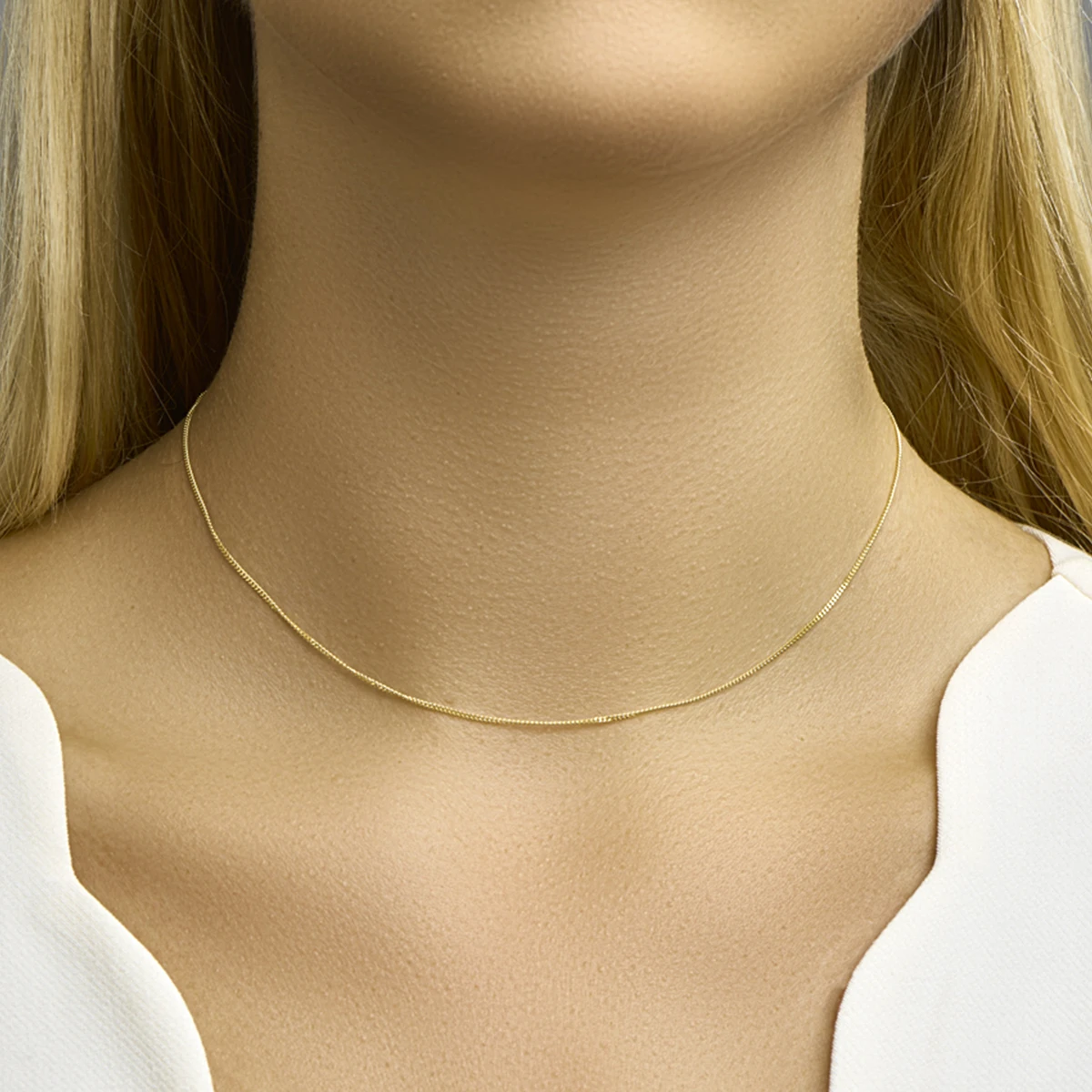 gourmette 1,1 mm 14K geelgoud