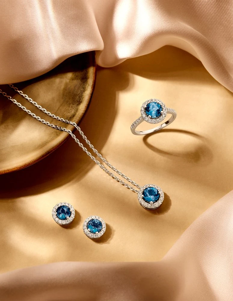 Collier witgoud briljant+london blue topaz