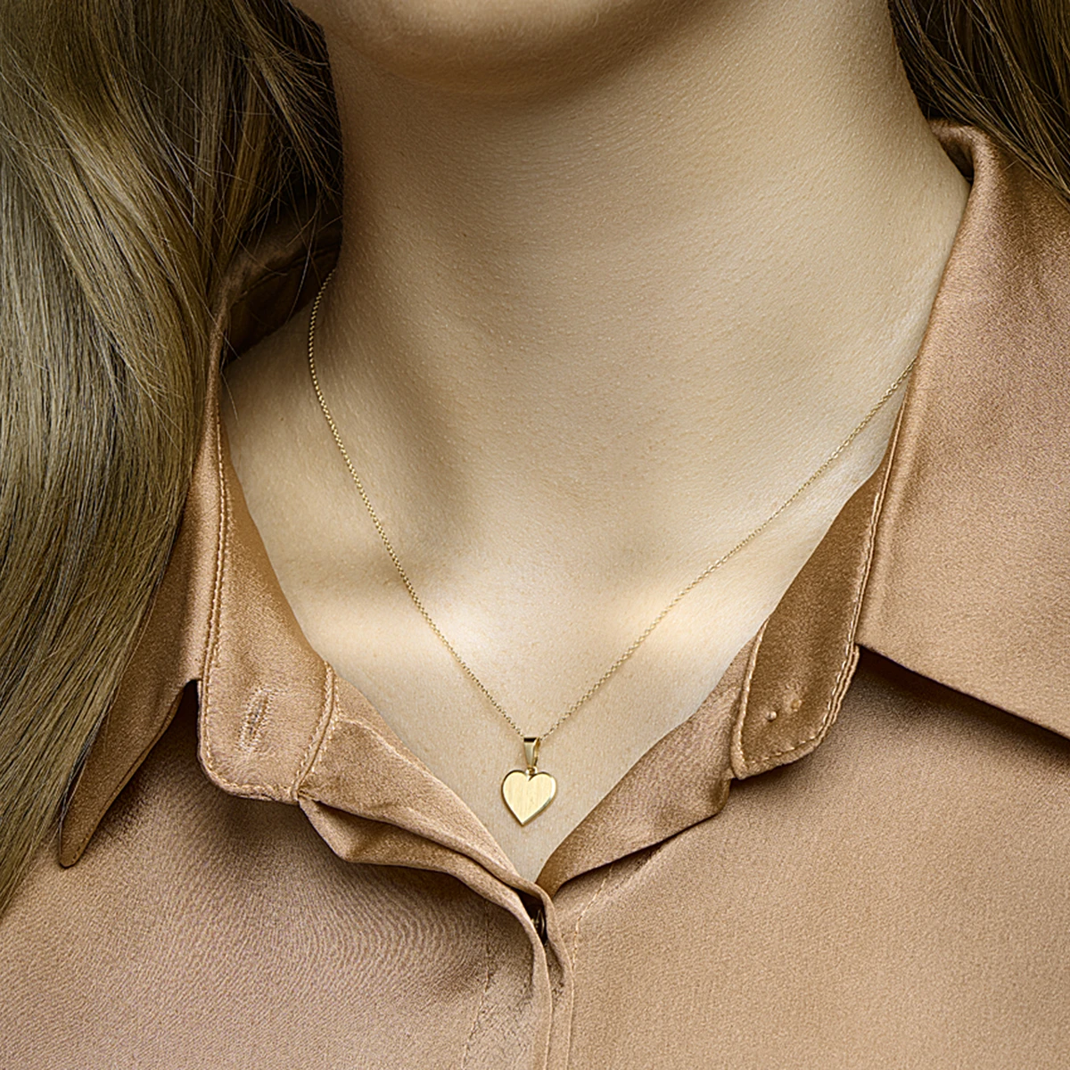 graveerhartje poli/mat 11 mm 14K geelgoud
