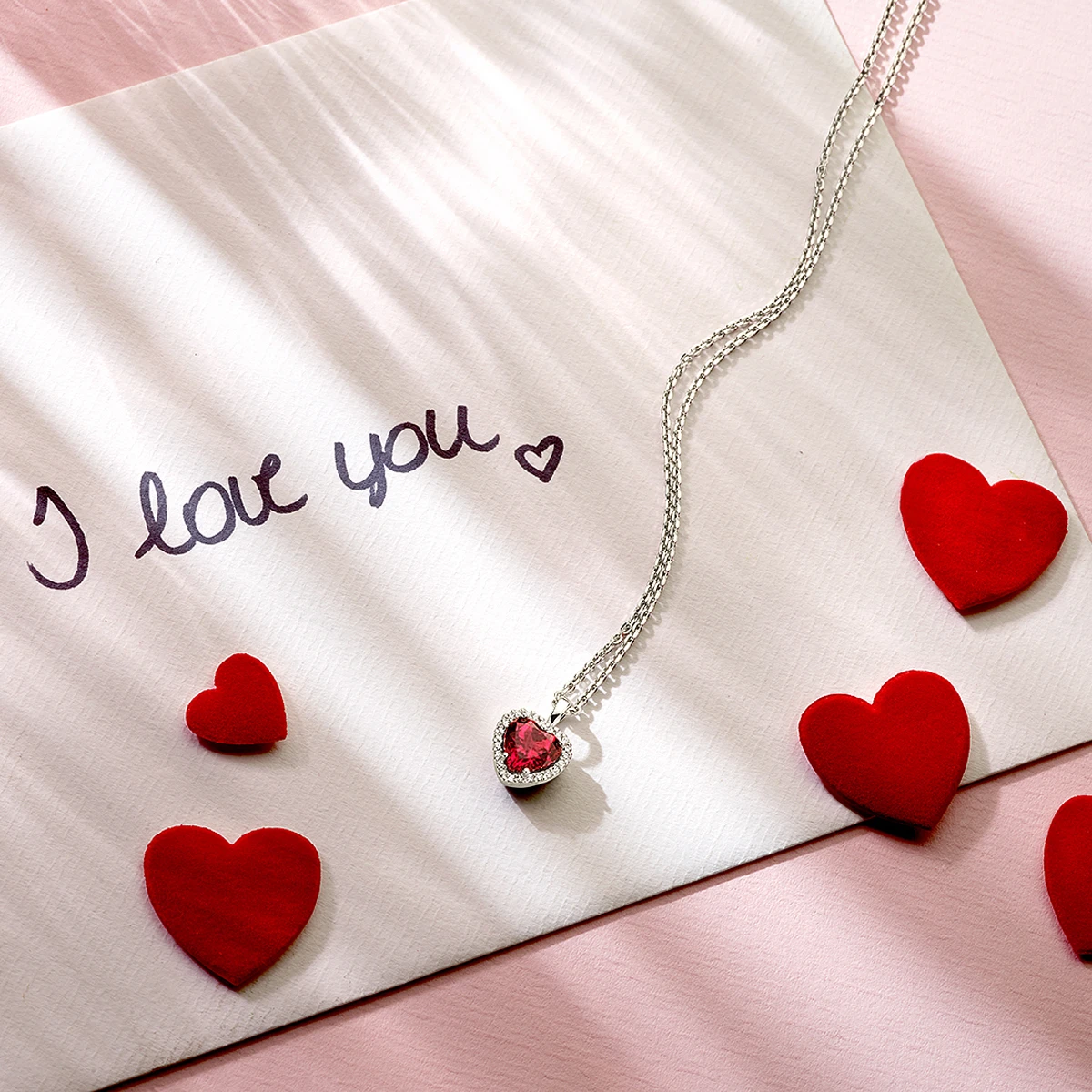 hanger hart rhodoliet en diamant 0.10ct h si halo 14K witgoud