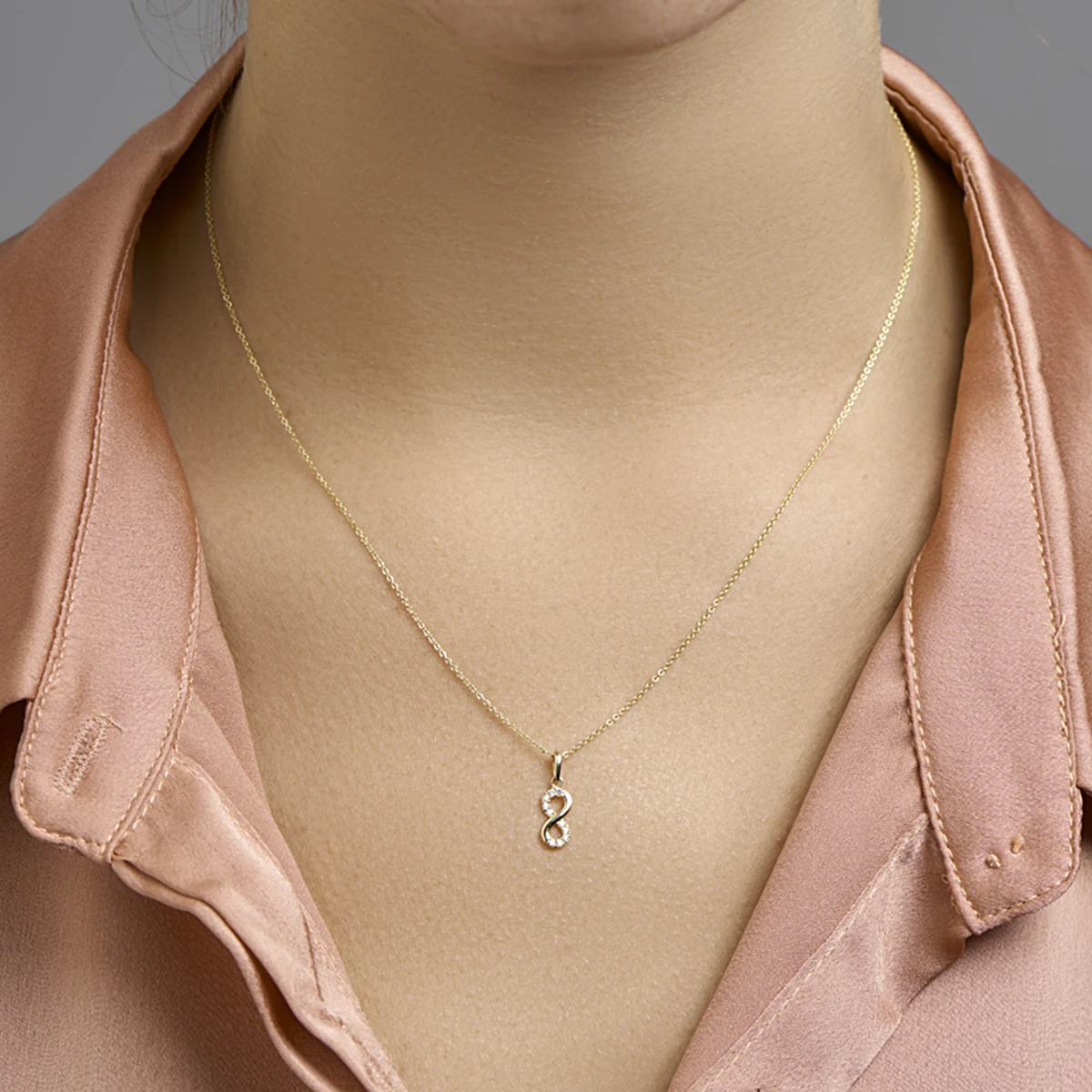 hanger infinity zirkonia 10 mm 14K geelgoud