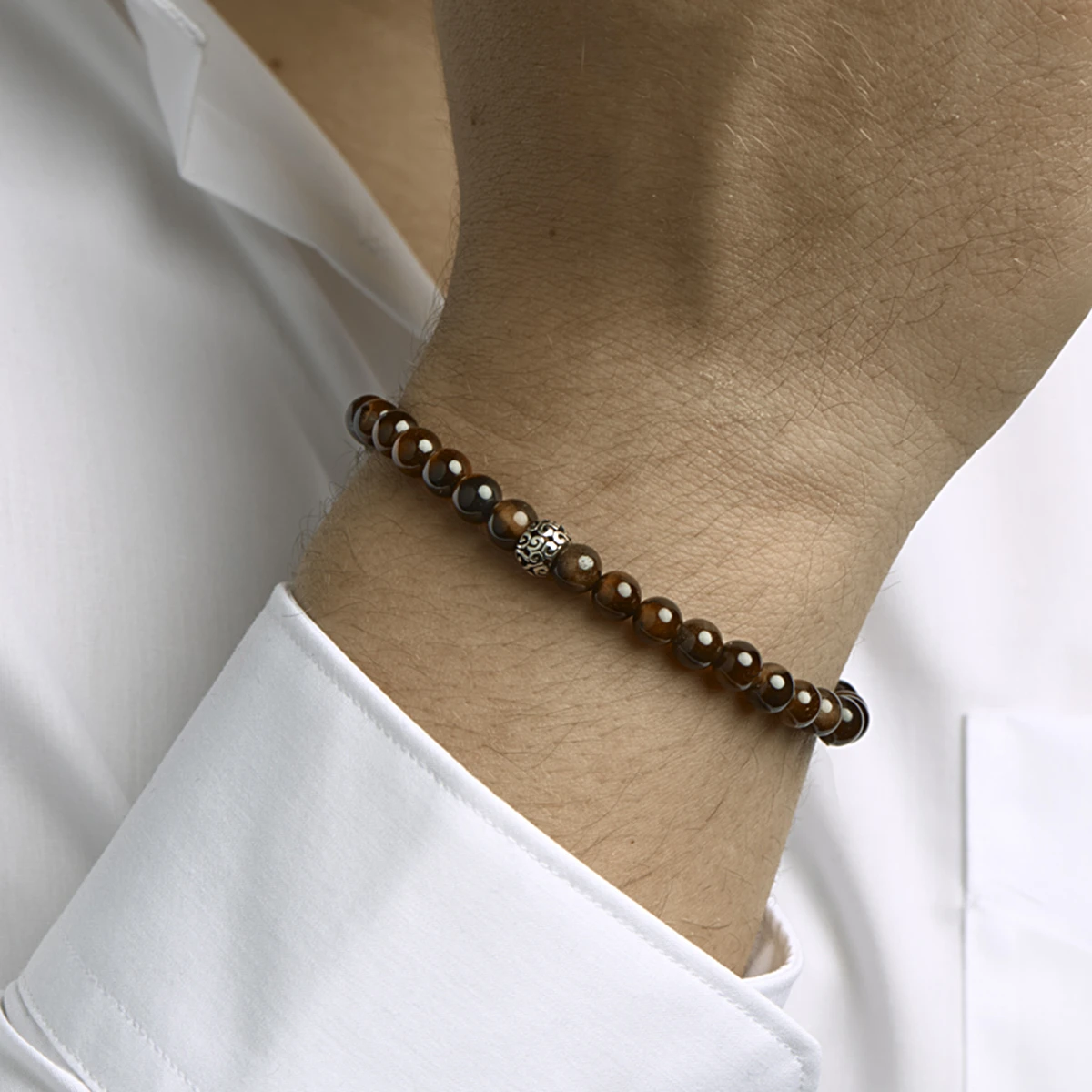 kralenarmband rood tijgeroog 6,5 mm 19 - 26 cm zilver gerhodineerd met rubber/nylon/leer