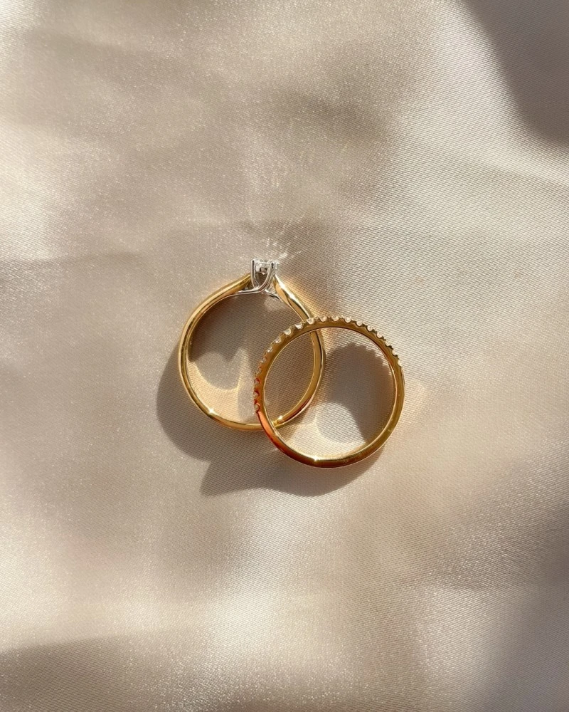 Ring bicolor briljant 0.19 crt. Maat 56
