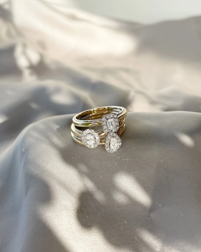 Ring bicolor briljant 0.32 crt. Maat 56