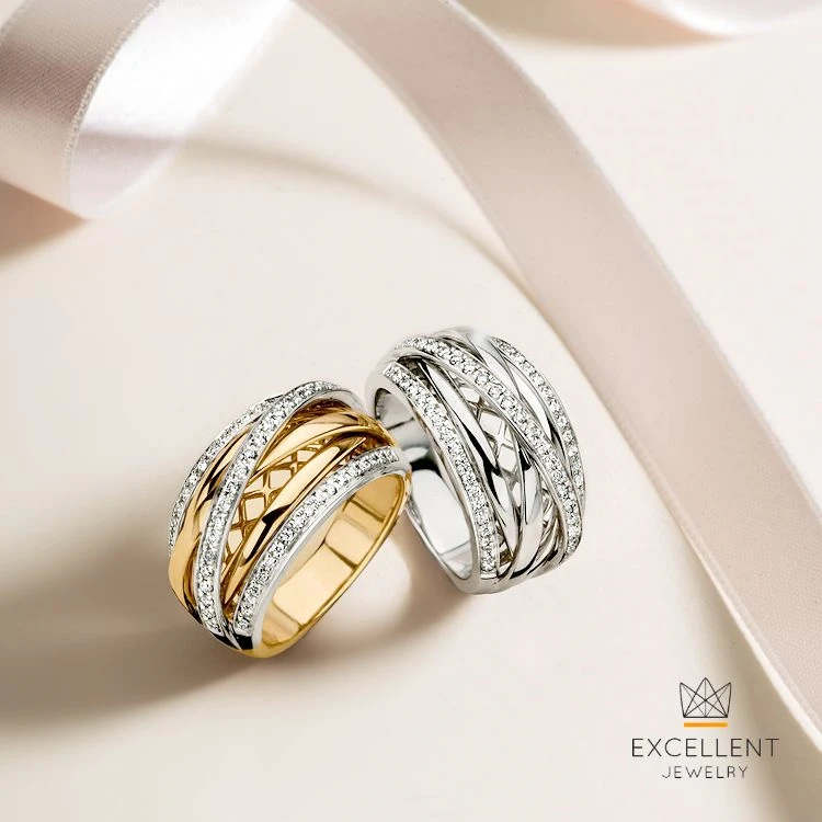 Ring bicolor briljant 0.34 crt. Maat 56