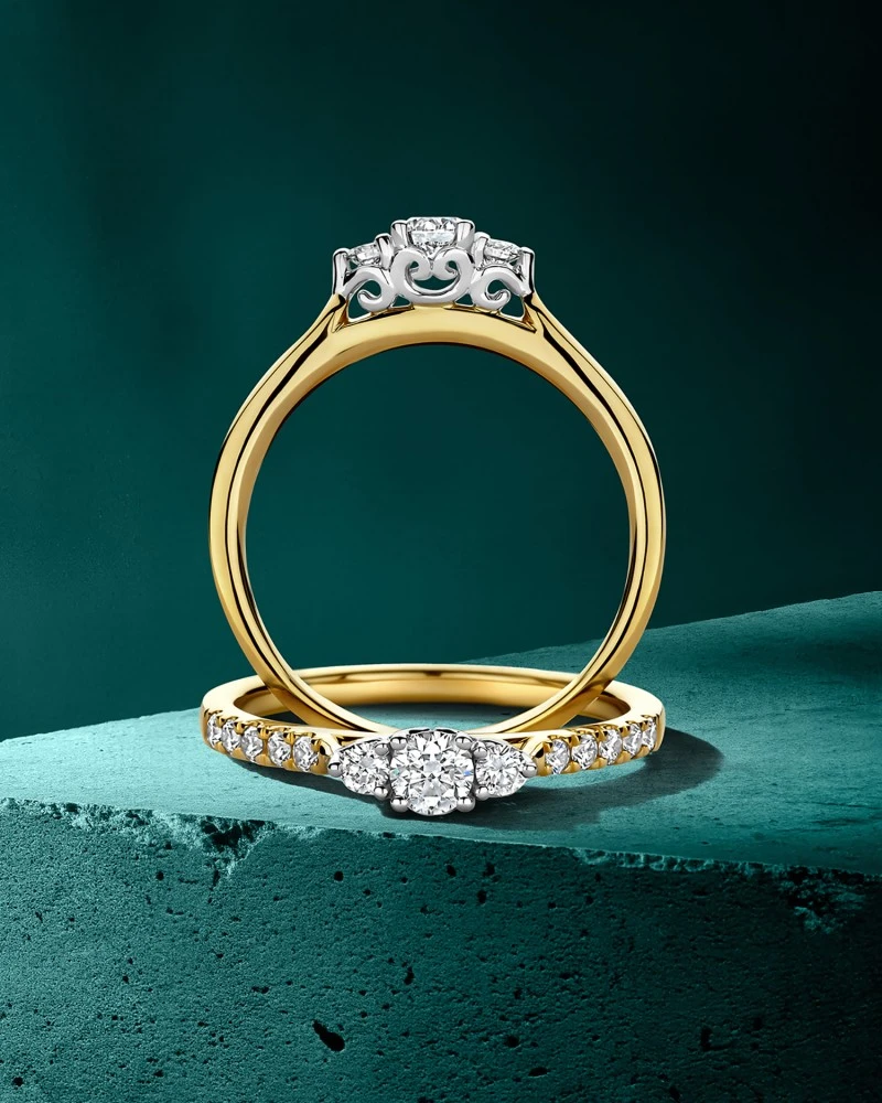 Ring bicolor briljant 0.46 crt. Maat 56