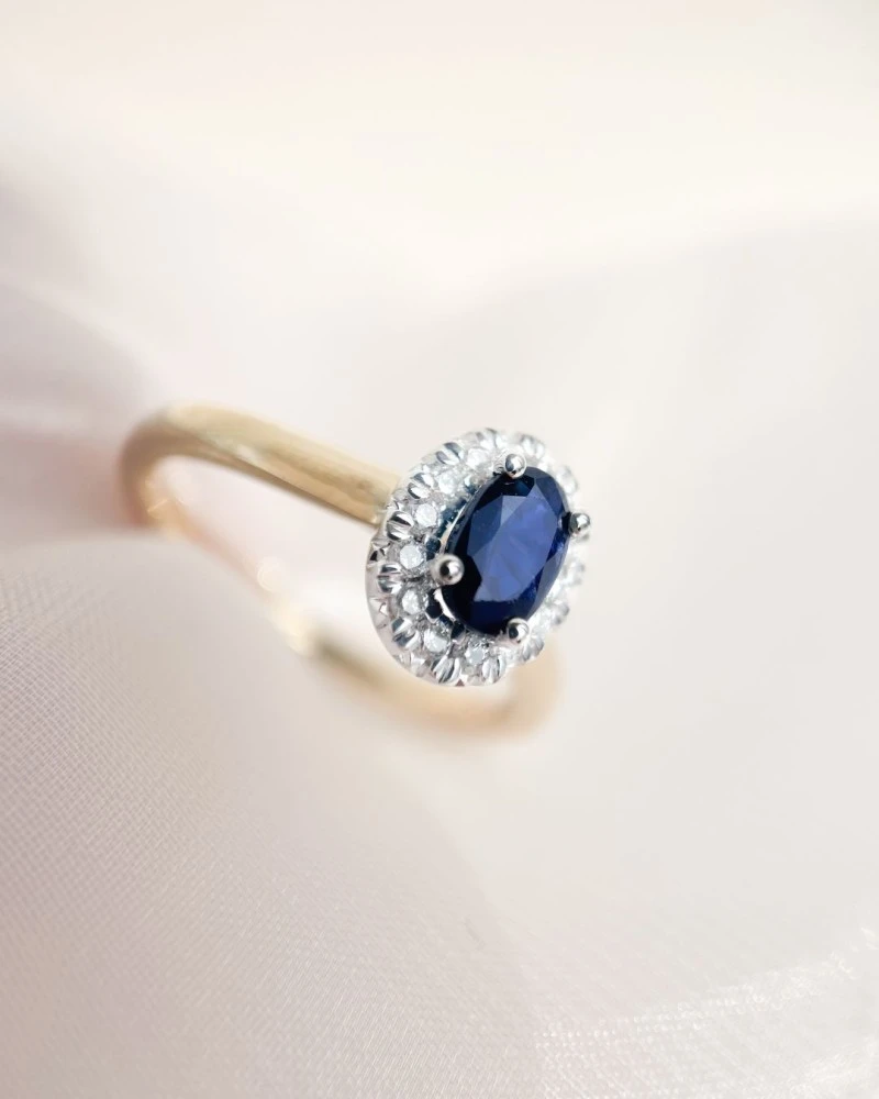 Ring bicolor briljant + saffier Maat 56