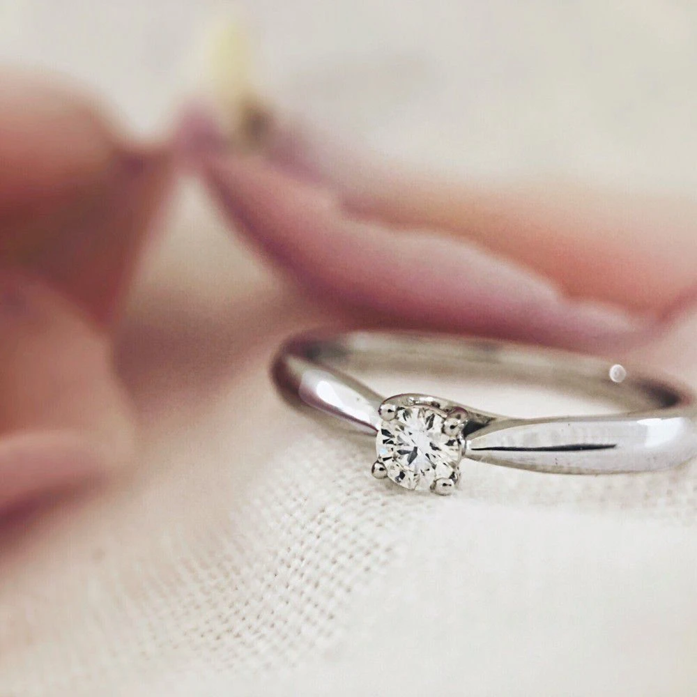 Ring witgoud briljant 0.16 crt. Maat 56
